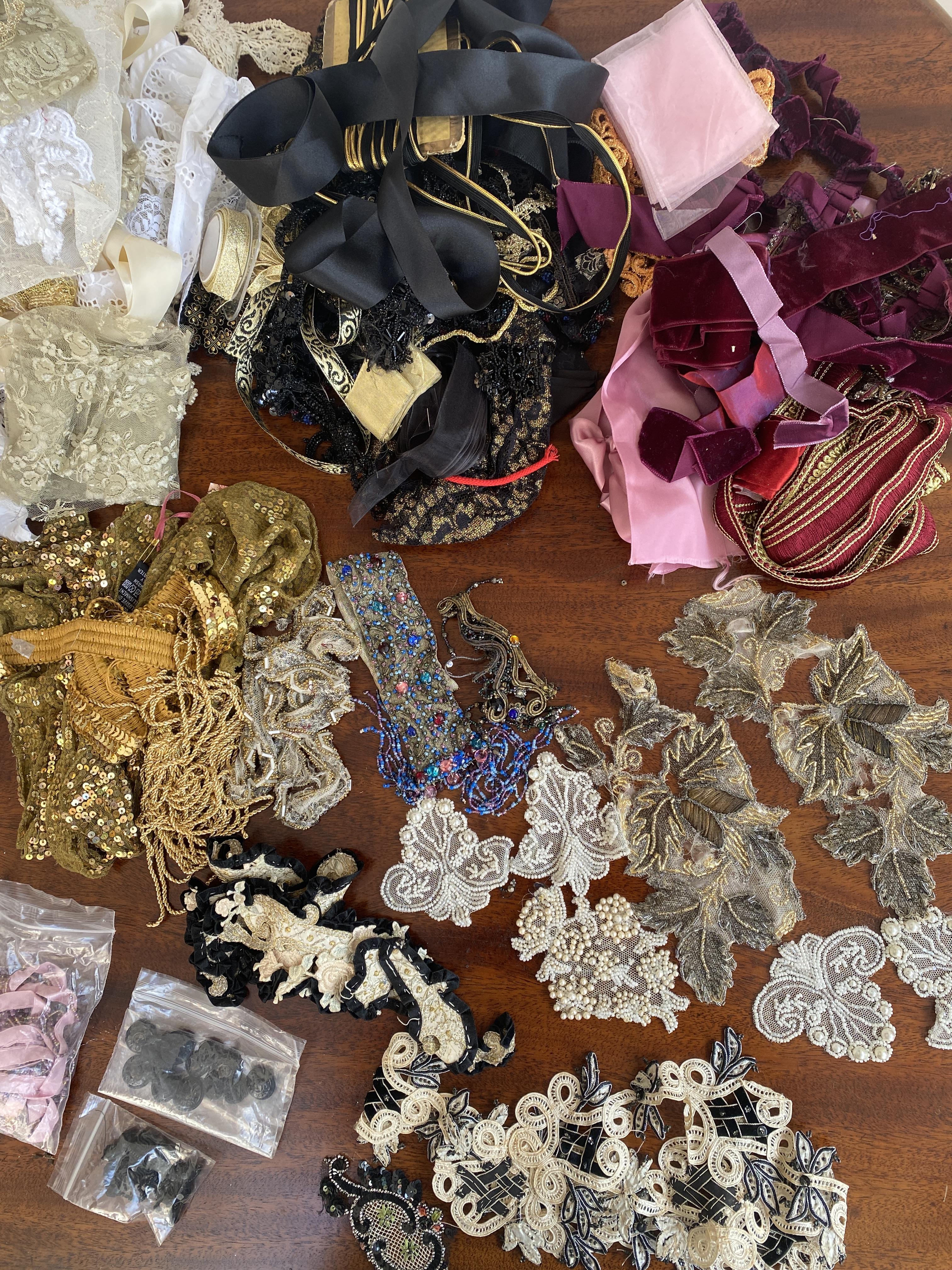 A large lot of costume trims – mix of vintage and modern, and antique beaded/lace pieces in black, cream, white, reds and pink ribbons and lace trims